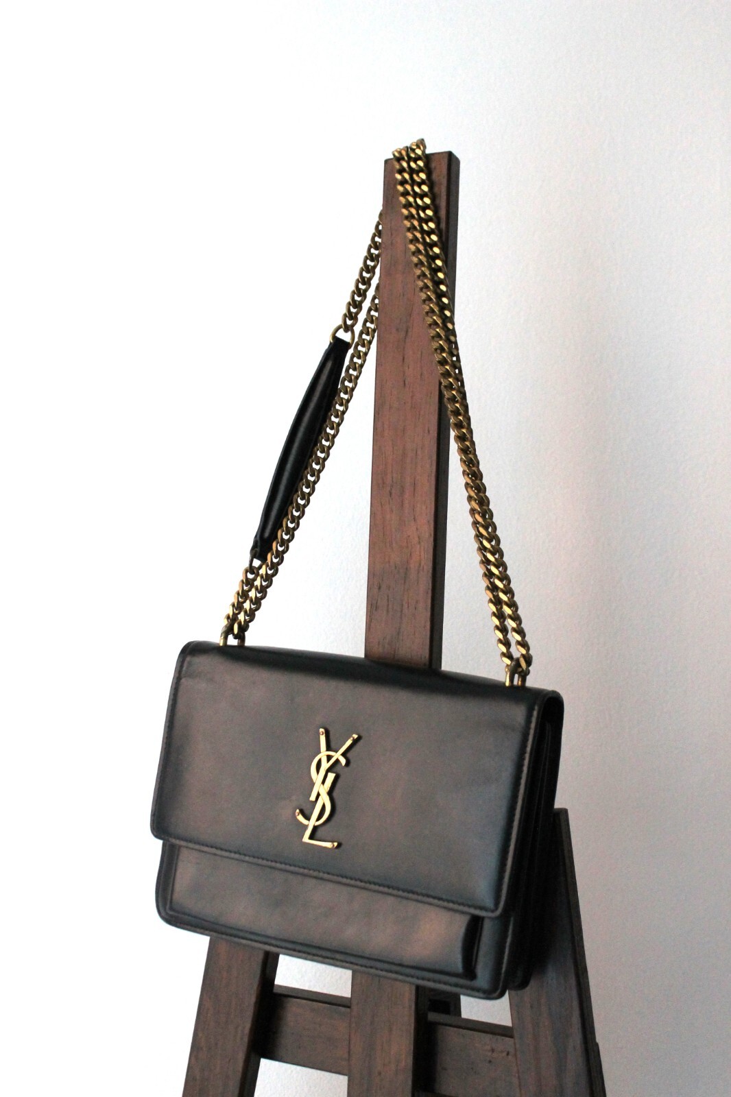 Yves Saint Laurent sac à main modèle Sunset en cuir noir