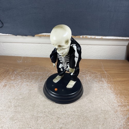 Gemmy Halloween Animated Dancing Grave Raver Groovin Ghoulies Skeleton ...