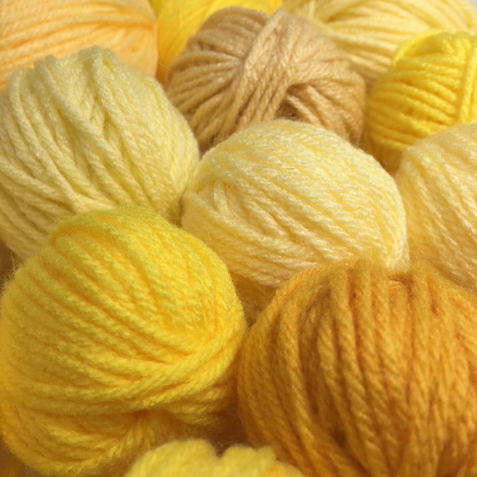 Bright yellow 100% acrylic 4-ply yarn remnants - 26 balls, 12 oz total