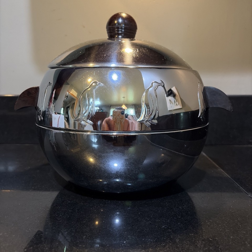 The West Bend Penguin Hot & Cold Server is a 1950s icon — shaped like an actual penguin, it's one of the most recognizable and beloved MCM kitchenware pieces ever made.