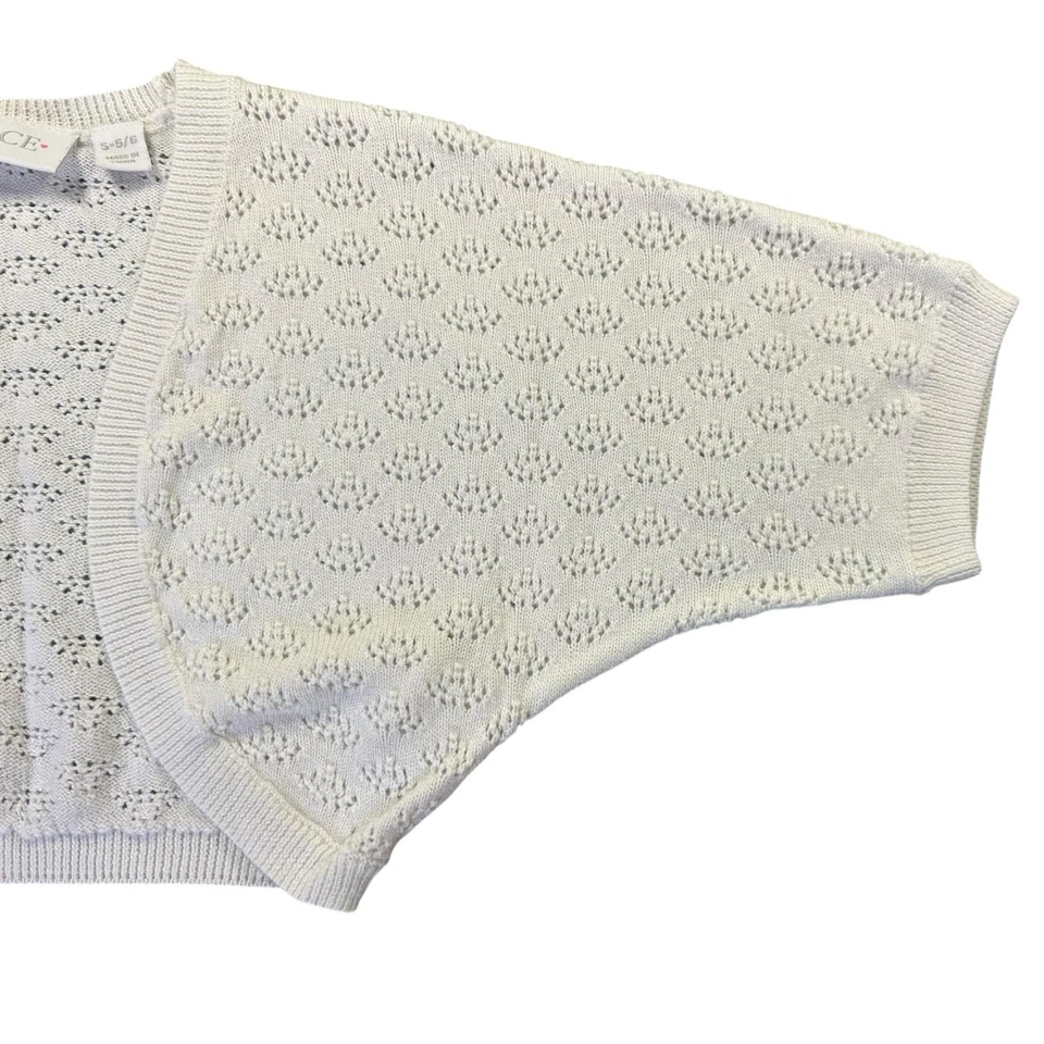 Bolero encogido de hombros marfil para niños talla 5 6 elegante con ojales frente abierto Top Foto 3 de 4