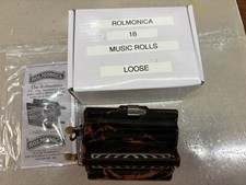 Rolmonica and 18 rolls works well and some rolls unused
