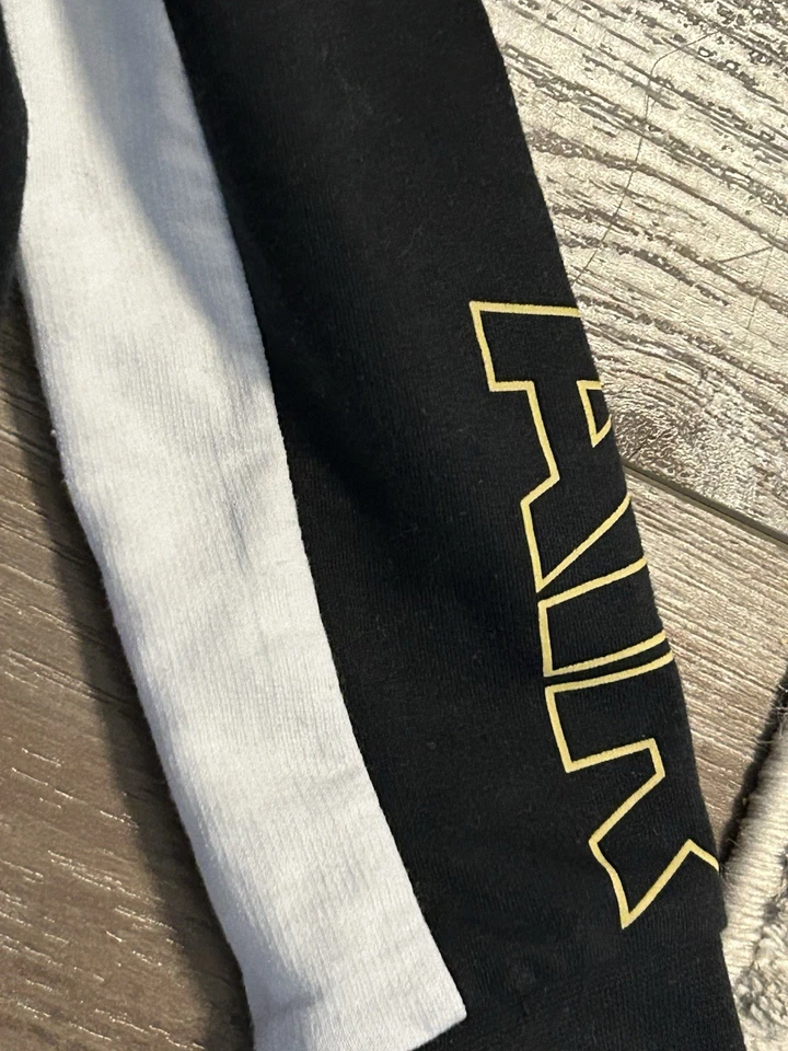 Conjunto Jordan Bebé Una Pieza Talla 24 Meses Blanco Negro Dorado Logo Cremallera Foto 4 de 4