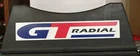 GT RADIAL TIRE VINTAGE PLASTIC 2 PIECE TIRE STAND