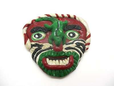 Odd little Pottery Mask with Lizard on the Nose