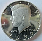 1989-S KENNEDY HALF DOLLAR DCAM CLAD (IMPAIRED) PROOF, MS++ CONDITION CIRCULATED