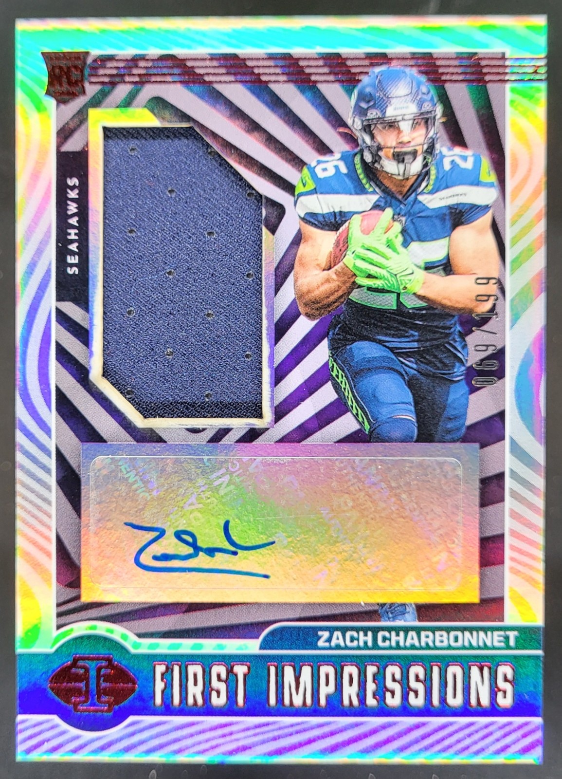 2023 Panini Illusions Zach Charbonnet First Impressions Red /199 MEM Auto RC AB4