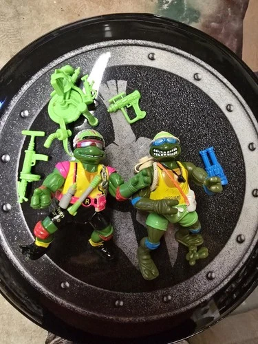 Vintage TMNT Sewer Cyclin Raph Action Figure and Lifeguard Leo Lot Of 2