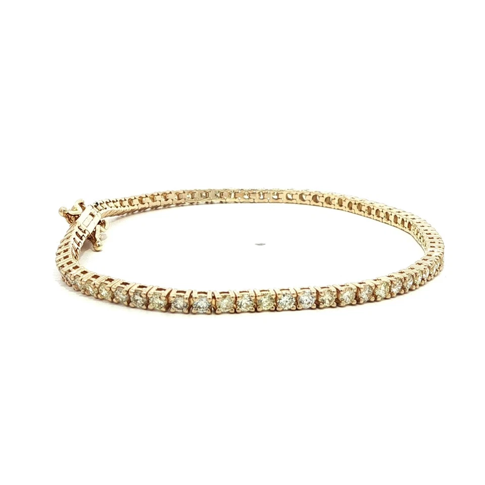 Brazalete de tenis de línea clásica de diamantes brillantes ardientes de 2,92 quilates de oro amarillo de 14 k Foto 3 de 4