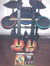 Xbox 360 Guitar Hero Bundle Lot Drum And 2 Guitars With Two Games No Foot Pedal