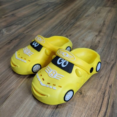 Boys' cartoon car slippers with soft soles. The look is fun and comfortable