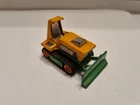 Matchbox Lesney 12 Big Bull in orange & green with black tracks. 1975