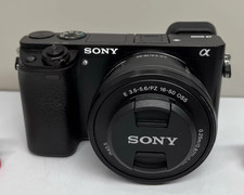 Sony Alpha A6000 Mirrorless Digital Camera w/16-50mm Lens English 98 new