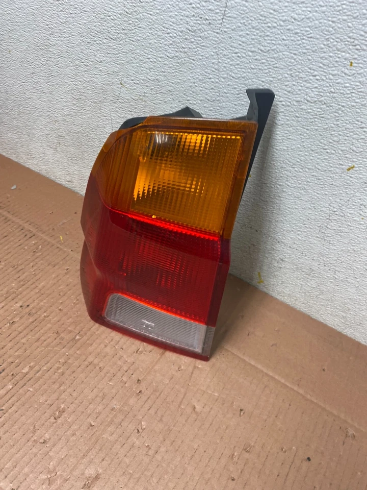 Luz trasera lateral derecha conductor izquierdo Mitsubishi Montero Sport 1998-2000 OEM M0141 DW Foto 2 de 4