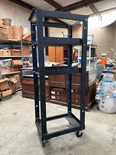 Server Rack 72in x 32in on wheels, 2 shelves. Aluminum.
