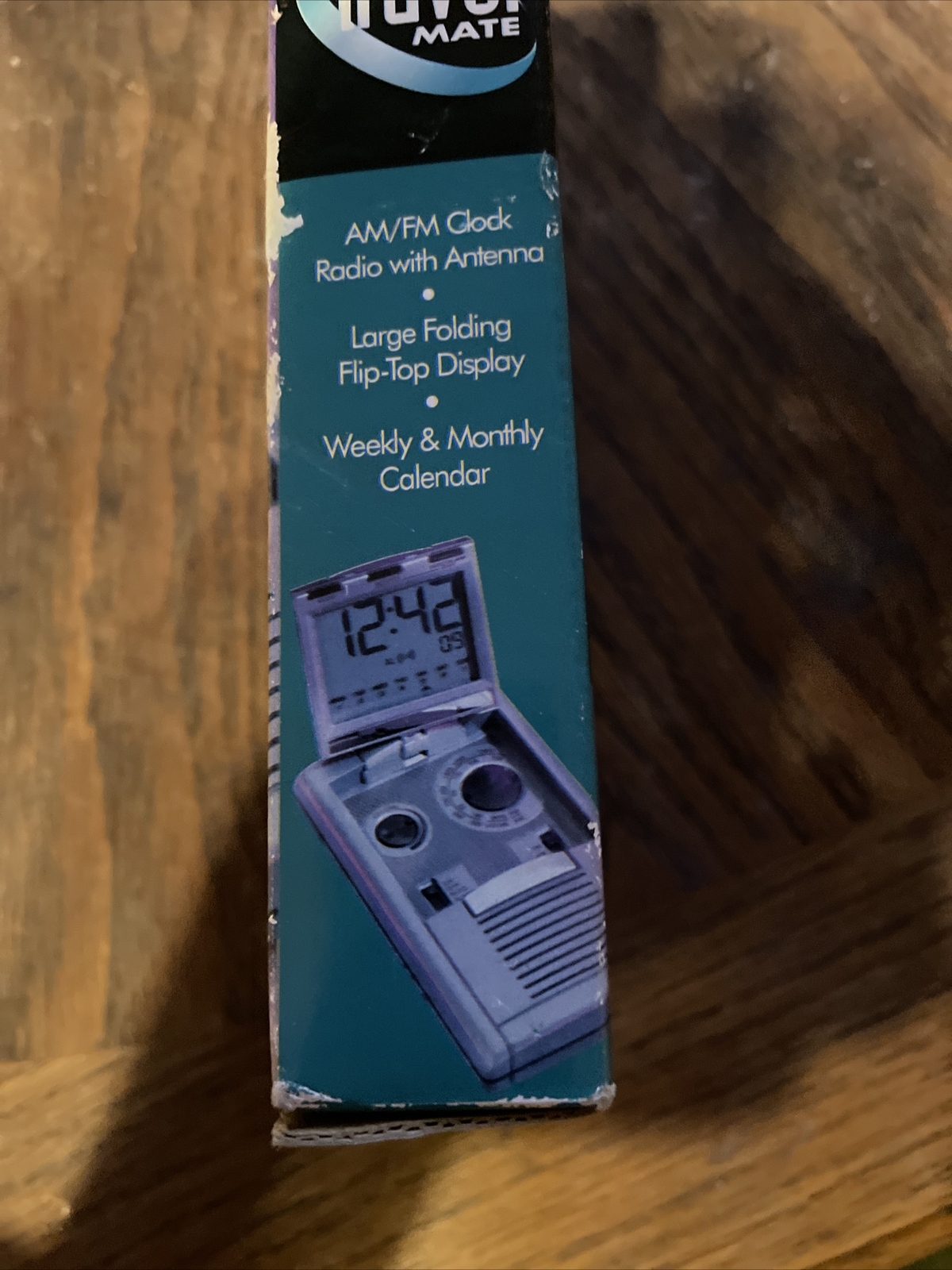 AM/FM Clock Radio With Folding Display Travel Mate.bx1