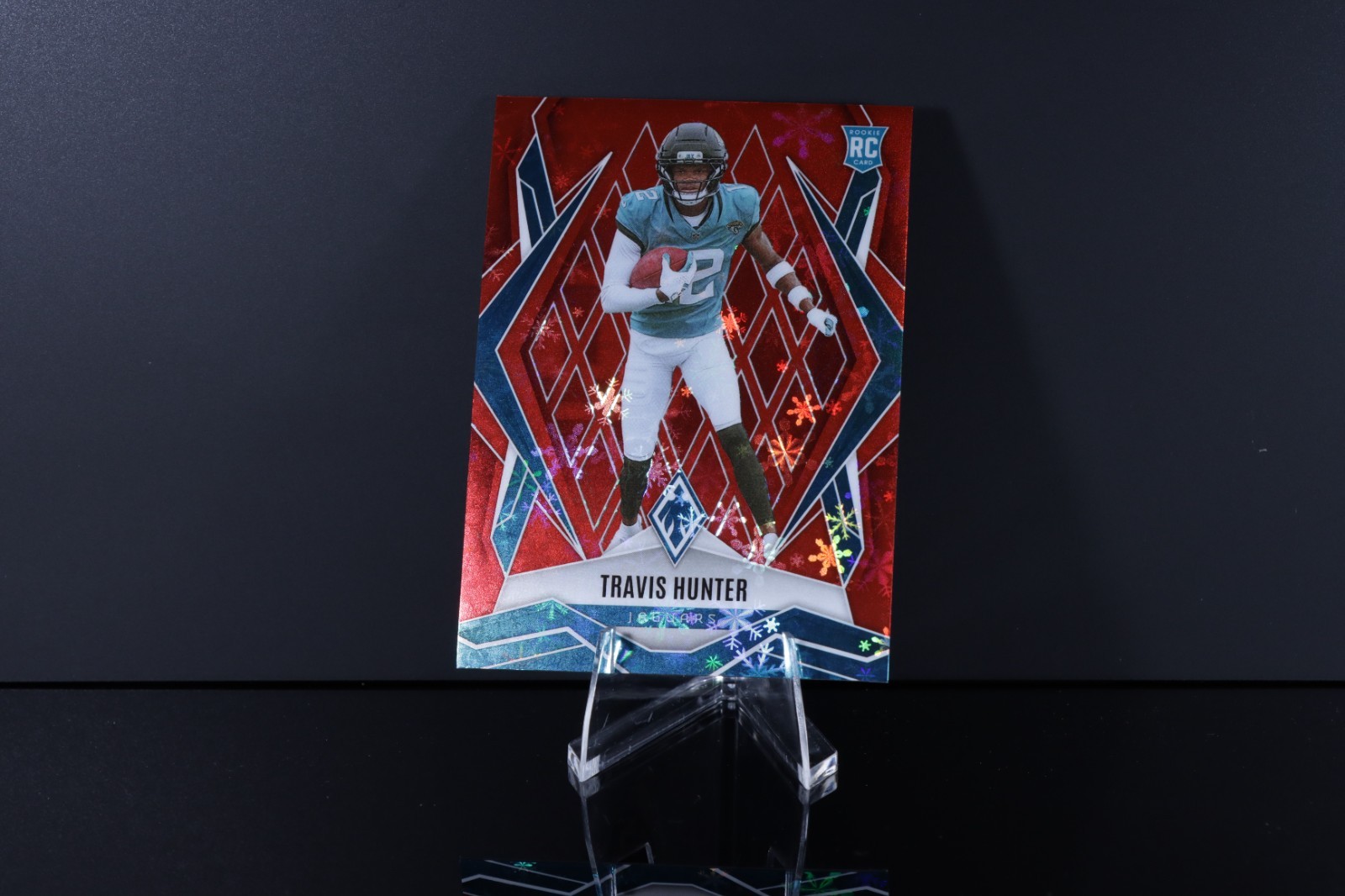 2025 Panini Phoenix - Rookies Travis Hunter #157 Red Winter /399 (RC) NM