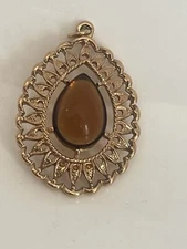 Sarah Coventry Goldtone Pendant w/Amber Plastic Center