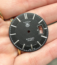 A Tag Heuer Carrera Automatic Calibre 5 Wristwatch Dial and winding crown.