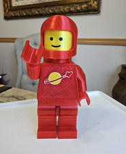 Red Spaceman Astronaut Figure with Space Logo