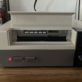 Authentic Nintendo (NES) Lot Of 18 Games, 2 Consoles, 4 Controllers And More