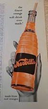 1956 hand Nesbitt's of California orange soda drink bottle with straw ad