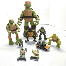 Lot of 9 Teenage Mutant Ninja Turtles  Action Figures  assorted