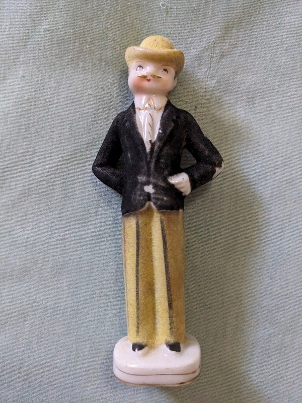 5" China Groom Salt Shaker, Molded body, Flocked Yellow hat and pants Black coat
