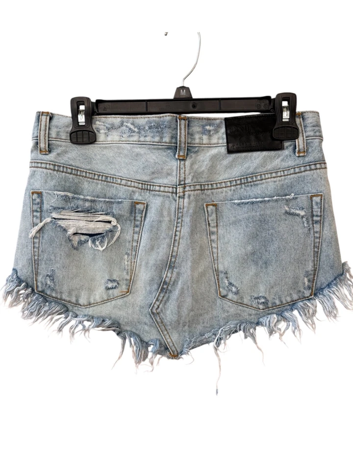 Falda vaquera de una cucharadita para mujer con corte de botón lavado claro Daisy Duke denim talla 27 Foto 2 de 4