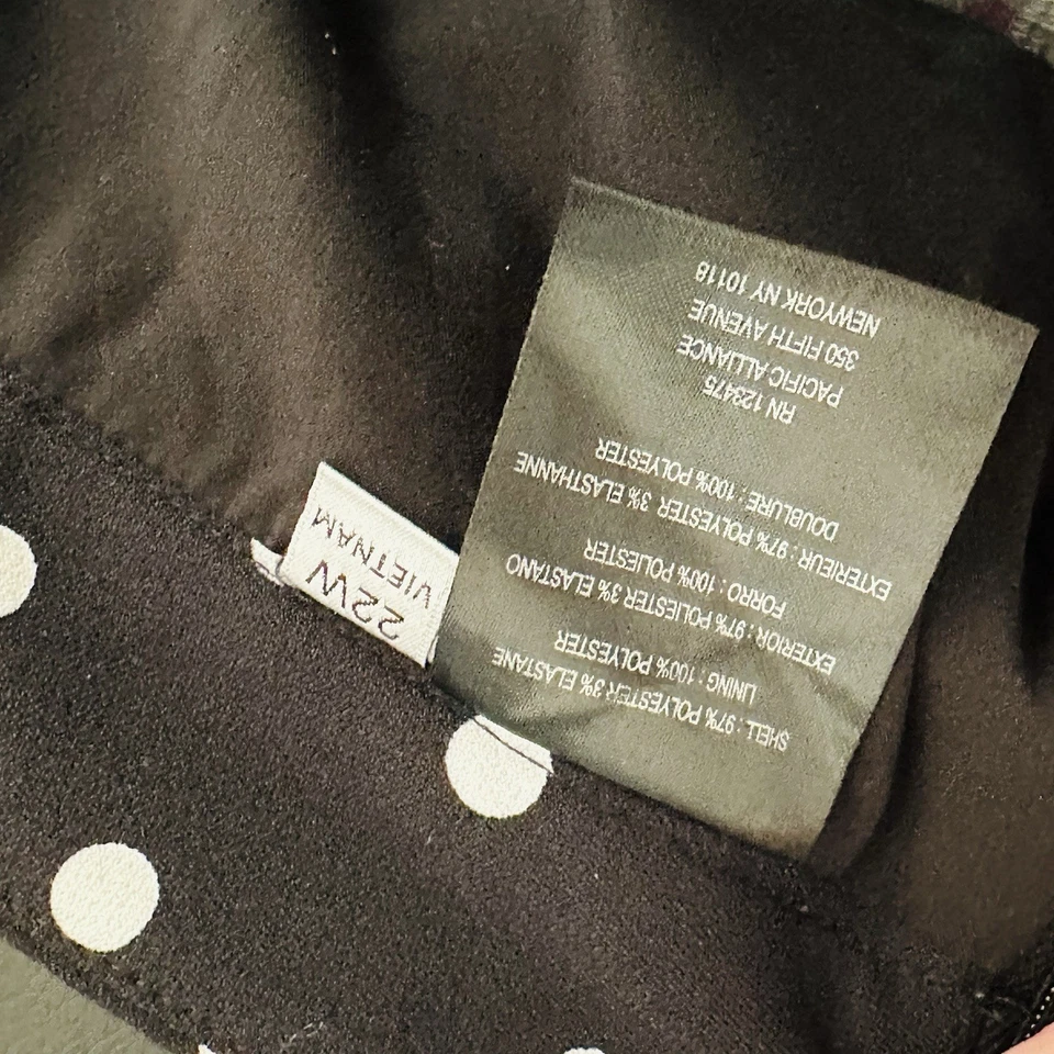 Falda midi Tahari negra blanca plisada forrada a lunares talla 22 Foto 4 de 4