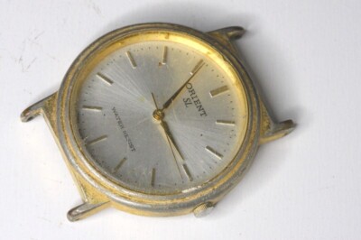 Orient SL Japan C7511 quartz watch , NO case back , for repairs or parts  -21709