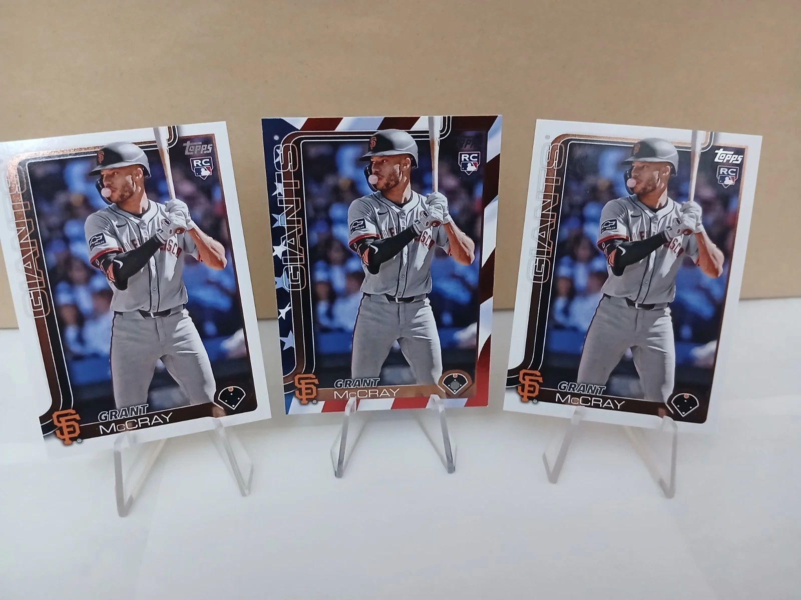 2025 Topps Series 1 #213 - Independence Day Flag SSP 24/76 - Grant McCray (RC)