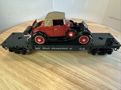 #ad MENARDS O GAUGE CHICAGO AND NORTHWESTERN FLATCAR WITH 1931 CHEVROLET COUPE $28.00