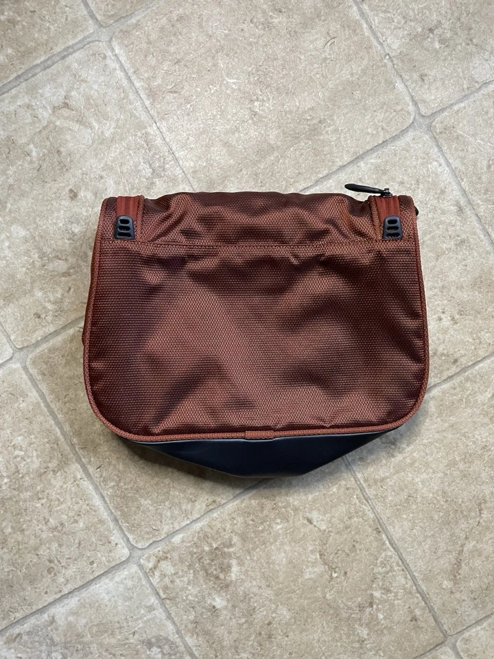 Bolso de Mano Tumi Tech Naranja y Gris Multi Bolsillo Cierre con Cremallera Foto 2 de 3