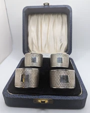 Set of 4 Cased Antique English Sterling Silver Napkin Rings "E" initial, d. 1936