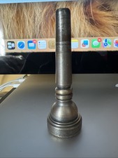 Vintage trumpet Mouthpiece smaller than 7c but large rant for big lips.