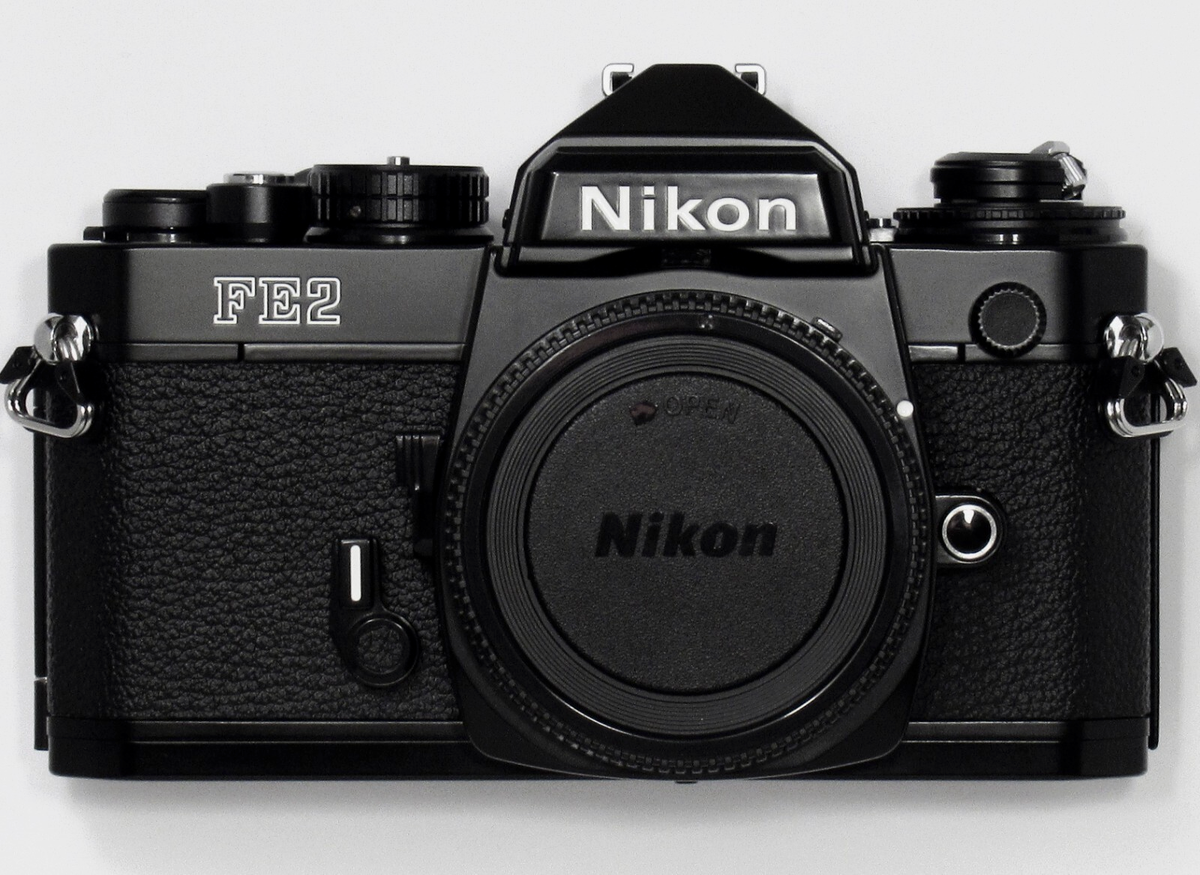 NEW in BOX UNUSED Nikon FE2 35mm Black Camera W/ Titan Shutter We