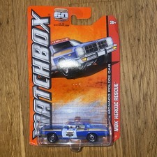 Matchbox Dodge Monaco Police Car Mattel MBX. VGC On Card.