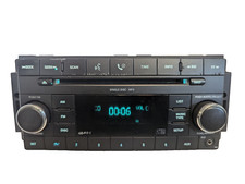 2008-2013  Chrysler Jeep Dodge Radio AUX MP3 CD Player P05064411AF   "CH870B"