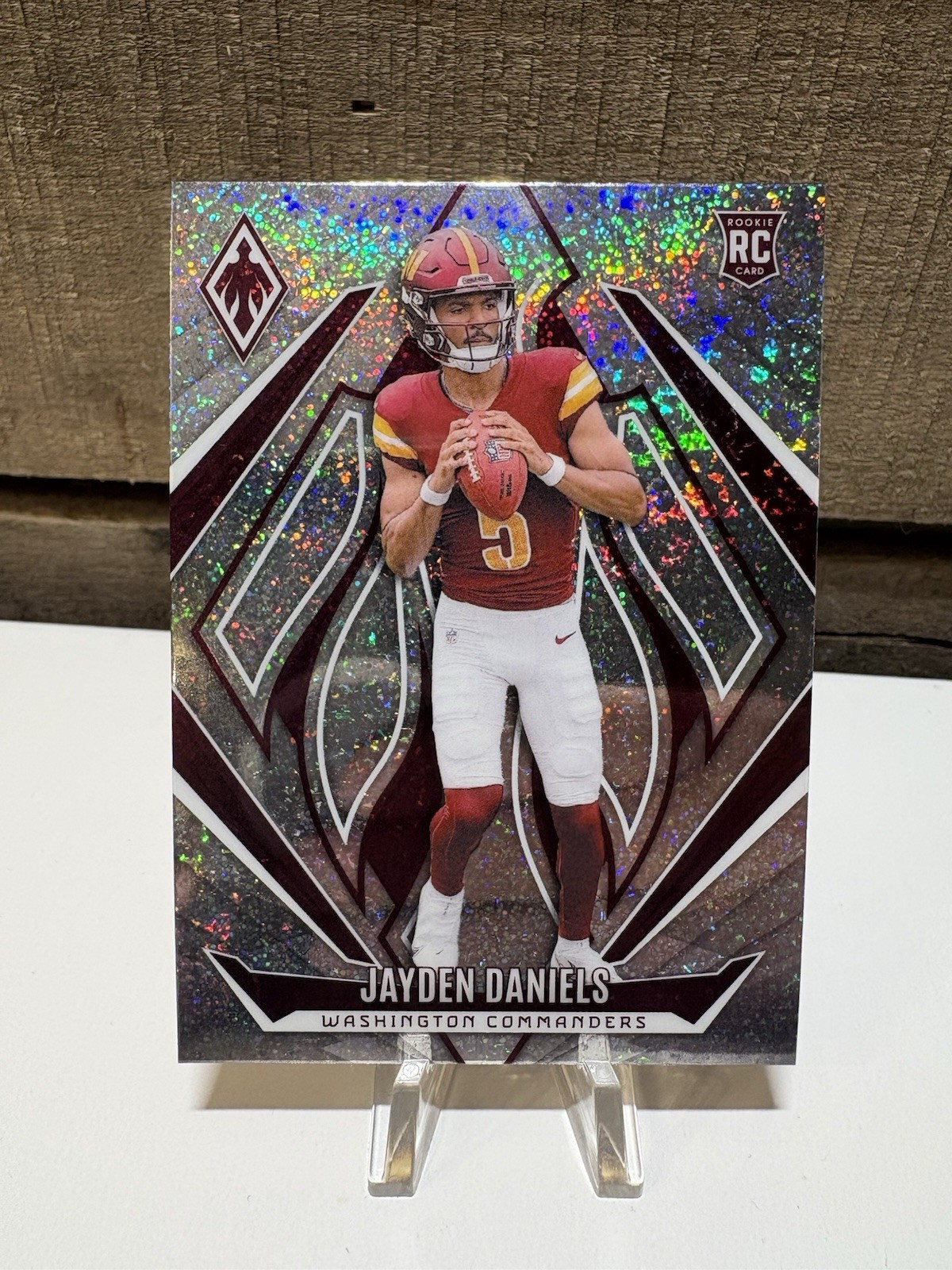 2024 Panini Phoenix #198 Jayden Daniels Rookie International Silver Prizm RC *sp