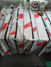 Polycotto fabric. White with Black, Red Geometric design, 145x122cms