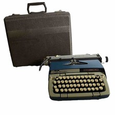 Smith Corona Classic 12 Typewriter Vintage W/Portable Brown hard Case. thumbnail