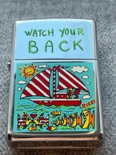 Zippo lighter James Rizzi, 1995. "Watch your Back" New, Never fired.