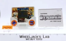 Strider W/Instruction Sheet 1988 Tiger Handheld Electronic Game WORKS