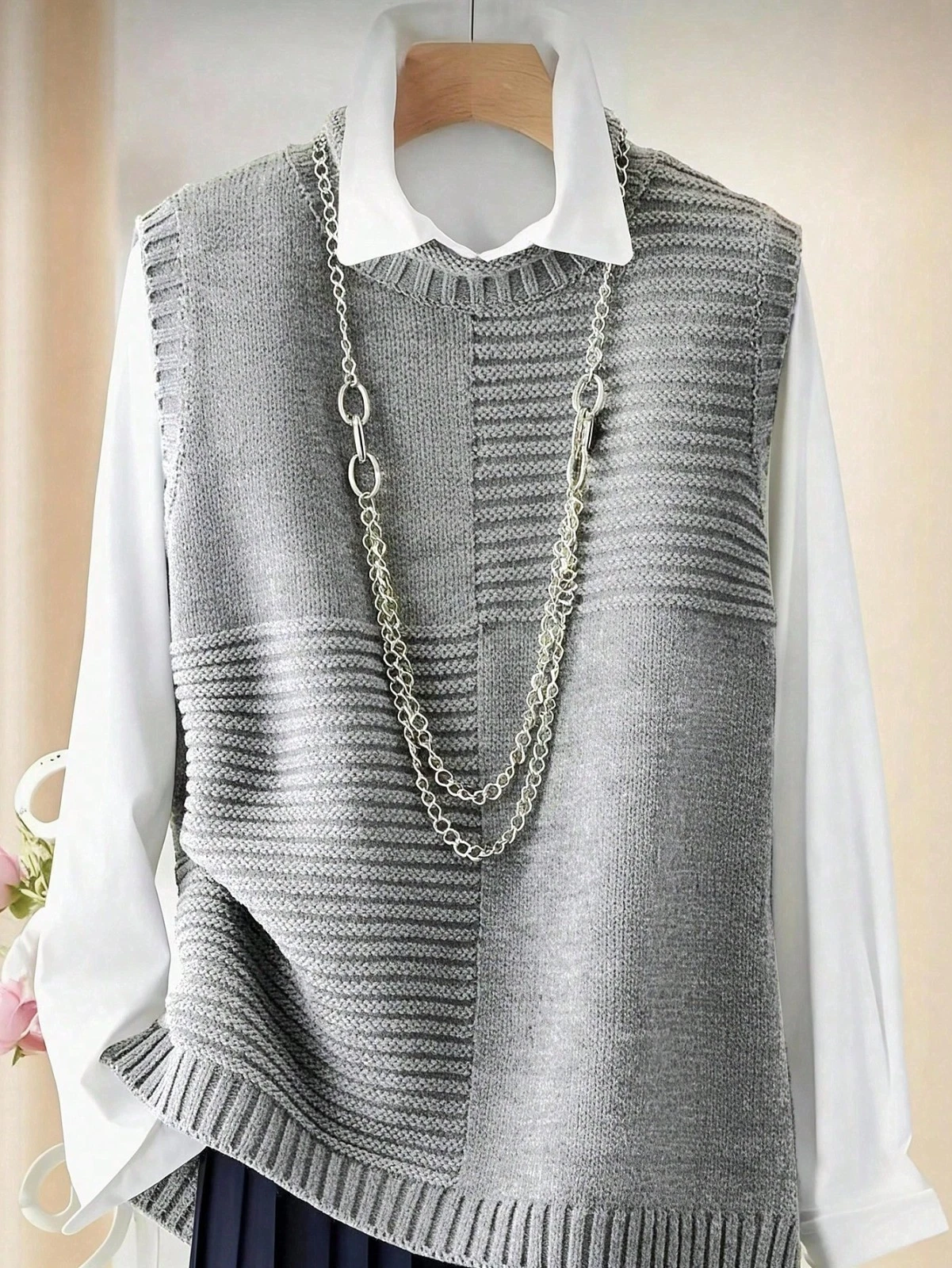 Elegant Grey Rib Knit Sweater Vest for Women | Casual Sleeveless Round Neck Knit
Opens in a new wind