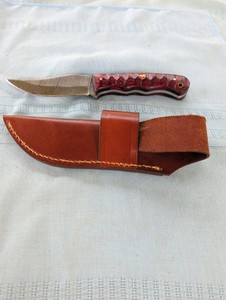 Damascus hunting knife w/ red Handle