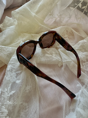 Prada PRA13S Oval Sunglasses | 18N10D-Tortoise Cognac Begonia Prada PRA13S Sunglasses Tortoise Cognac Begonia/Light Brown main image 3