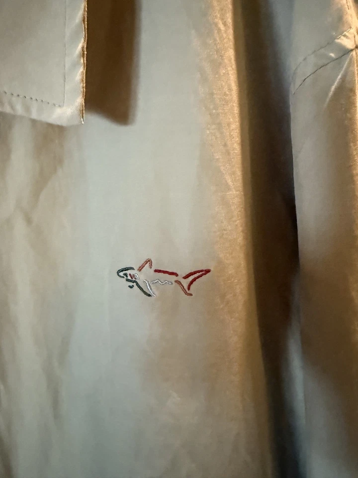 Chaqueta cortavientos de golf Shark by Greg Norman para hombre talla MED, tostada, logotipo de tiburón usada en excelente estado Foto 2 de 4