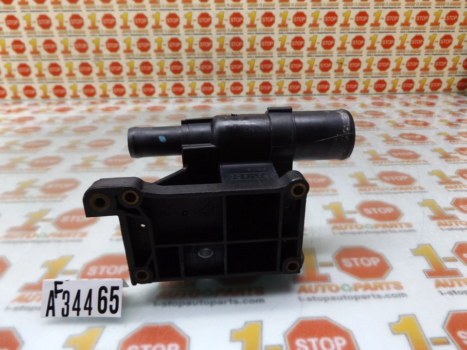 Ford Focus 2003-2007 termostato salida refrigerante crossover 6S4Z-8K556-A OEM Foto 3 de 4