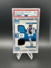 BRYCE YOUNG 2023 NATIONAL TREASURES DUAL MATERIALS /99 PANTHERS PSA 9 MINT